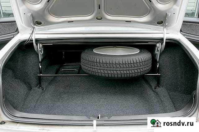 Полка под запаску в багажник на волгу Строитель - изображение 1