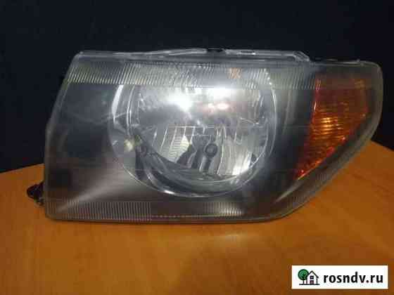 Фара Mitsubishi Pajero Pinin Левая Коммунар