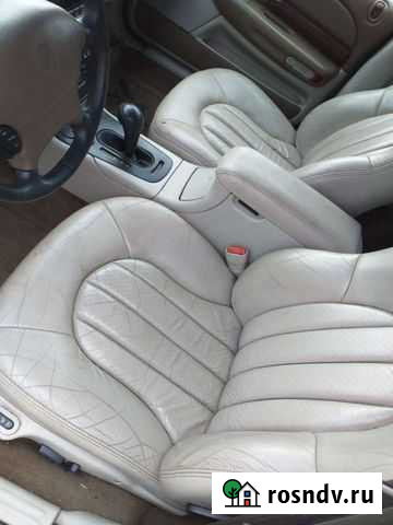 Салон на крайслер 300м 2000год 3.5 Большие Колпаны - изображение 1