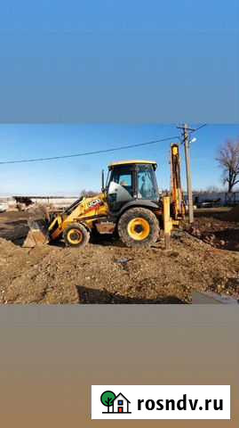 Аренда Экскаватор-погрузчик, ямобур, вилы Смоленская - изображение 1