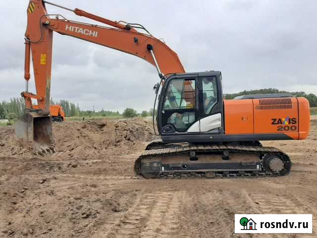 Услуги гусеничного экскаватора Волгоград - изображение 1