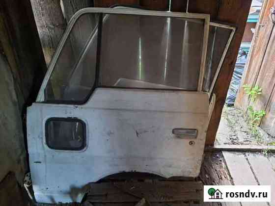 Двери к а/м Nissan Atlas SGH40 Нижнеудинск