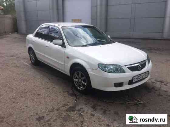 Аренда Mazda 2004год АКПП Красноярск