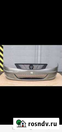 Бампер пер.Renault Logan (09-13г.) Новый, в цвет Норильск - изображение 1