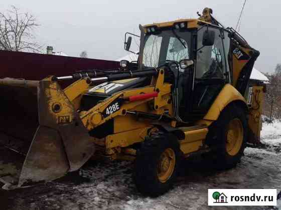 Услуги экскаватора погрузчика CAT- 428 Прокопьевск