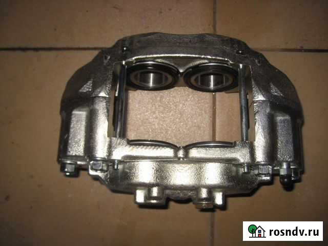 Суппорт передний левый новый Land Cruiser 80Lexus Екатеринбург - изображение 1