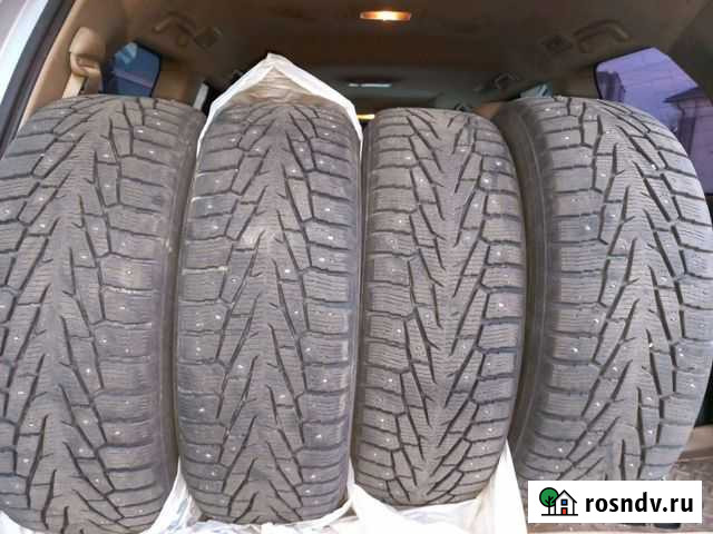 Продам зимние шипованные шины б/у 245/65R17 Выборг - изображение 1