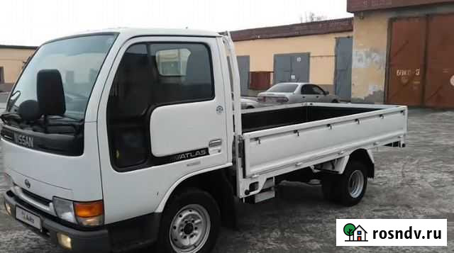 Nissan Atlas бортовой, 1997 Белогорск - изображение 1