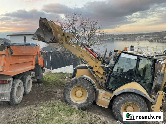 Услуги экскаватора-погрузчика,гидромолот и ямобур Севастополь - изображение 1