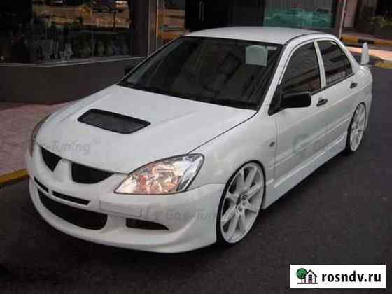 Тюнинг обвес Evolution 9 на Mitsubishi Lancer 9 Домодедово