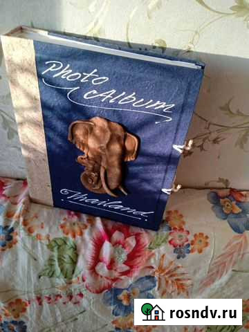 Альбом для фотографий, на обложке фигурка мамонта Магадан - изображение 1
