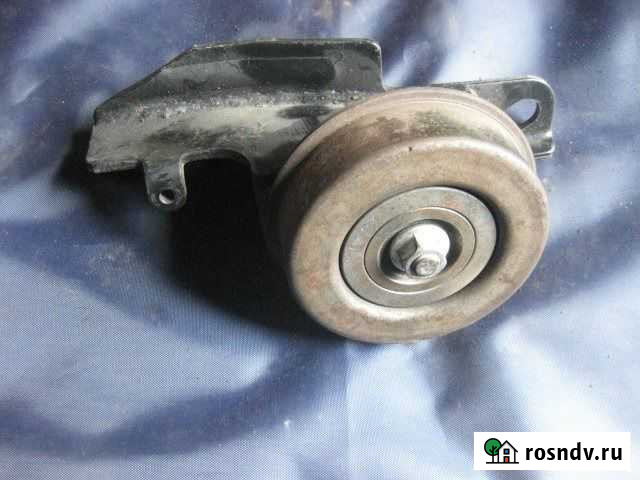 Ролик натяжной насоса гура Mitsubishi Pojero V43W Бердск - изображение 1