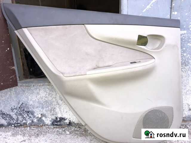 Обшивка двери (дверная карта) Toyota Corolla Axio Комсомольск-на-Амуре - изображение 1