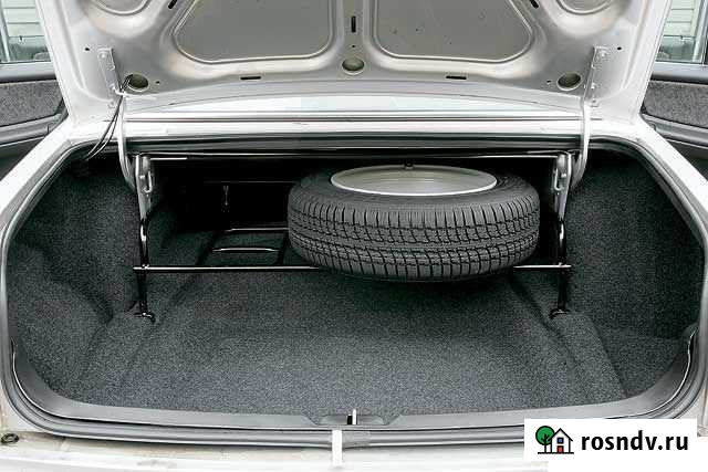 Полка под запаску в багажник на волгу Строитель - изображение 1