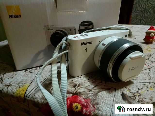 Компактный фотоаппарат Nikon 1j1 Белая Калитва - изображение 1